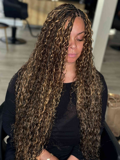 Fula Beauty Deep Wave Boho Hair in 1B natural black, showing wavy texture and full volume.