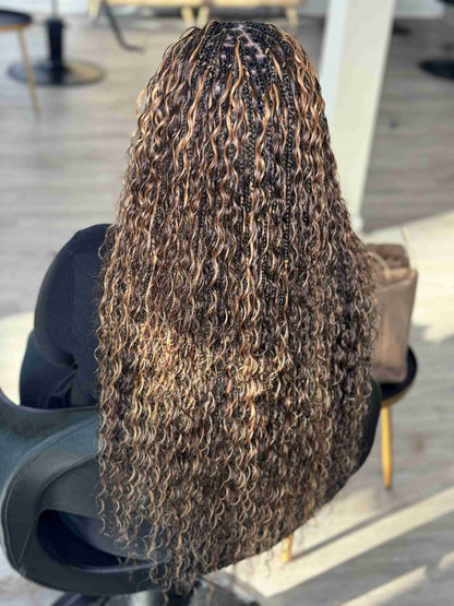 Fula Beauty deep wave boho hair in natural black, 12-inch length, showcasing soft, flowing curls and textured wave pattern.
