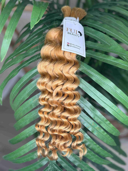 Deep Wave Boho Hair by Fula Beauty in 1B natural black, showcasing luscious, wavy hair texture with a natural shine.