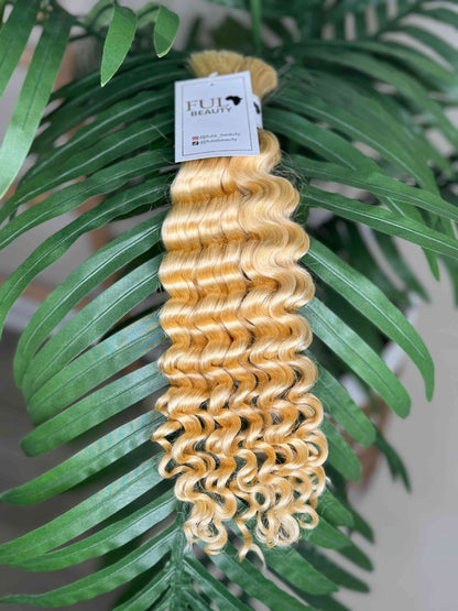 Fula Beauty Deep Wave Boho Hair in natural black, 12-inch length with soft, wavy texture on a mannequin head.