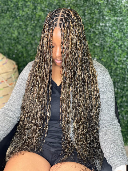 Fula Beauty Deep Wave Boho Hair in natural black, 12-inch length, showcasing soft, wavy texture and full volume.