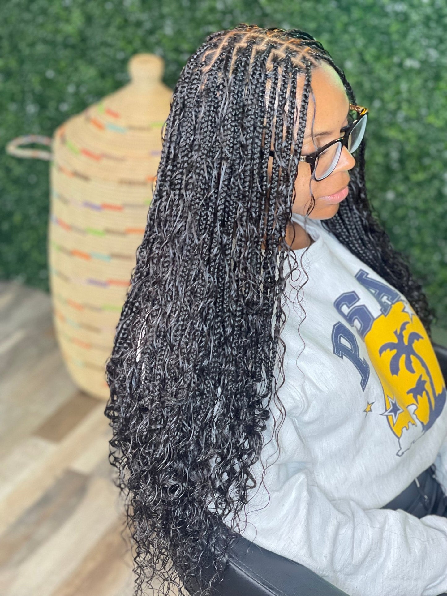 Fula Beauty Deep Wave Boho Hair in natural black, 12-inch length, showing wavy, textured hair strands.