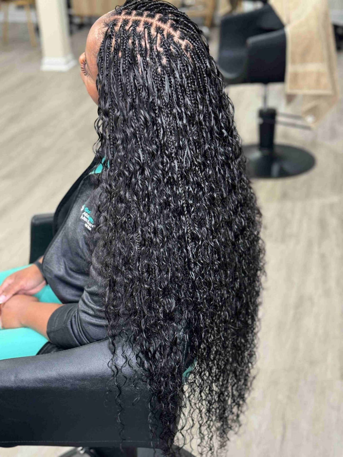 Fula Beauty Italian Curl boho hair in natural black, showcasing soft, defined curls with a stylish and relaxed look.