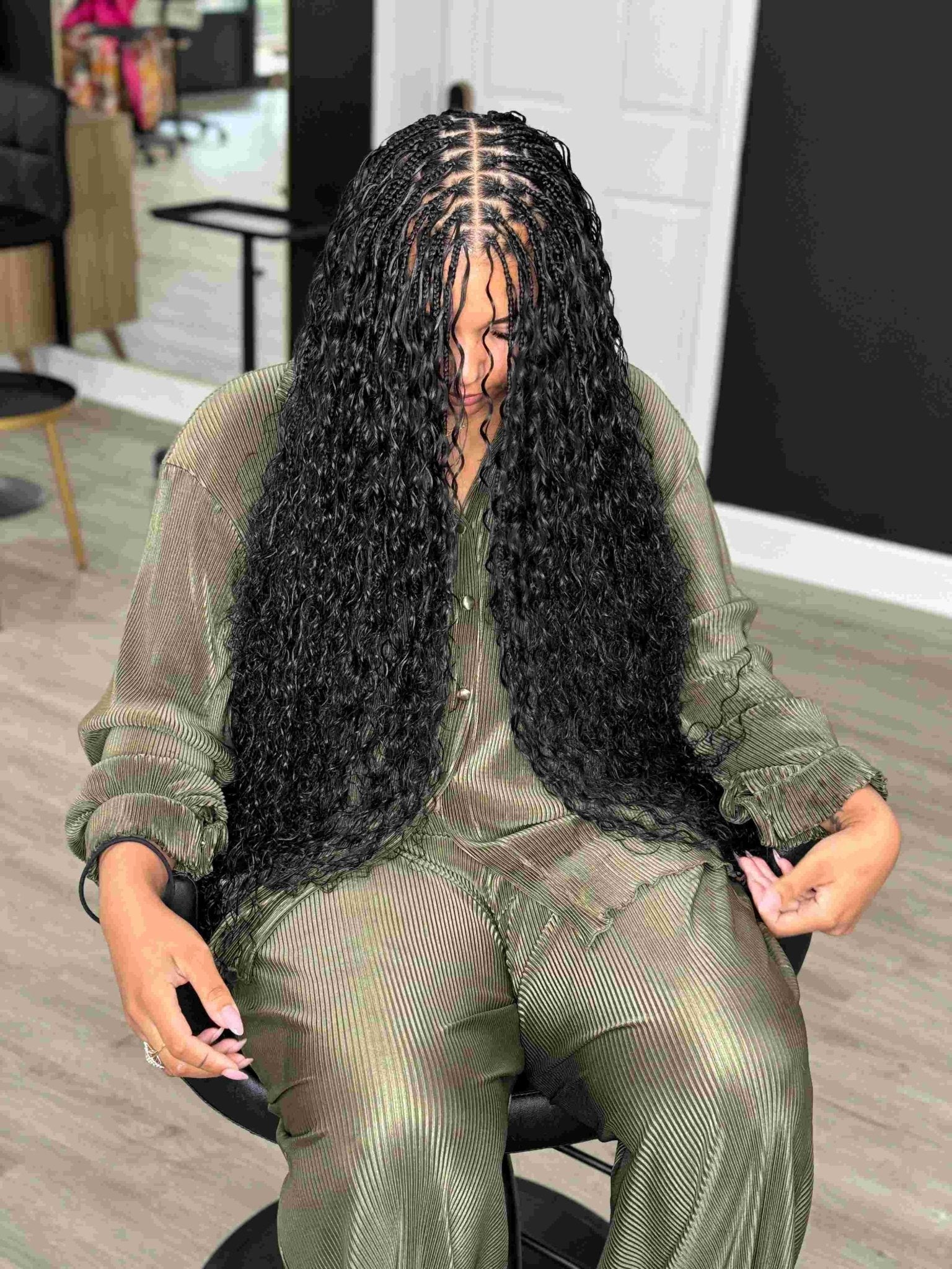 Fula Beauty Italian Curl Boho Hair in natural black, showcasing soft, defined curls on a model with flowing hair.