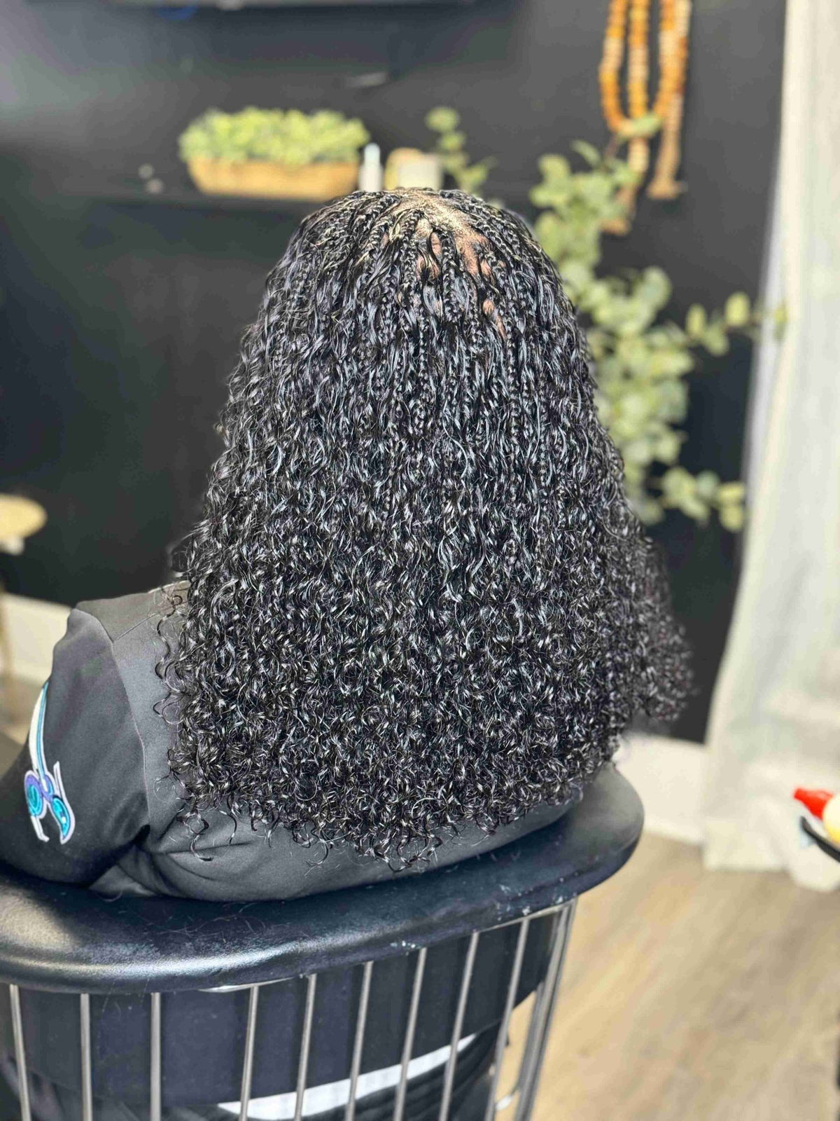 Fula Beauty Italian Curl boho hair in natural black with soft, defined curls, showcasing a stylish hair look.