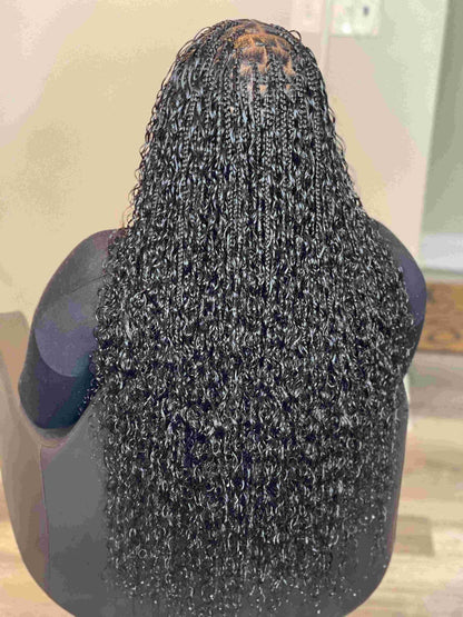 Fula Beauty Italian Curl boho hair in natural black, showcasing soft, defined curls on a model's head.