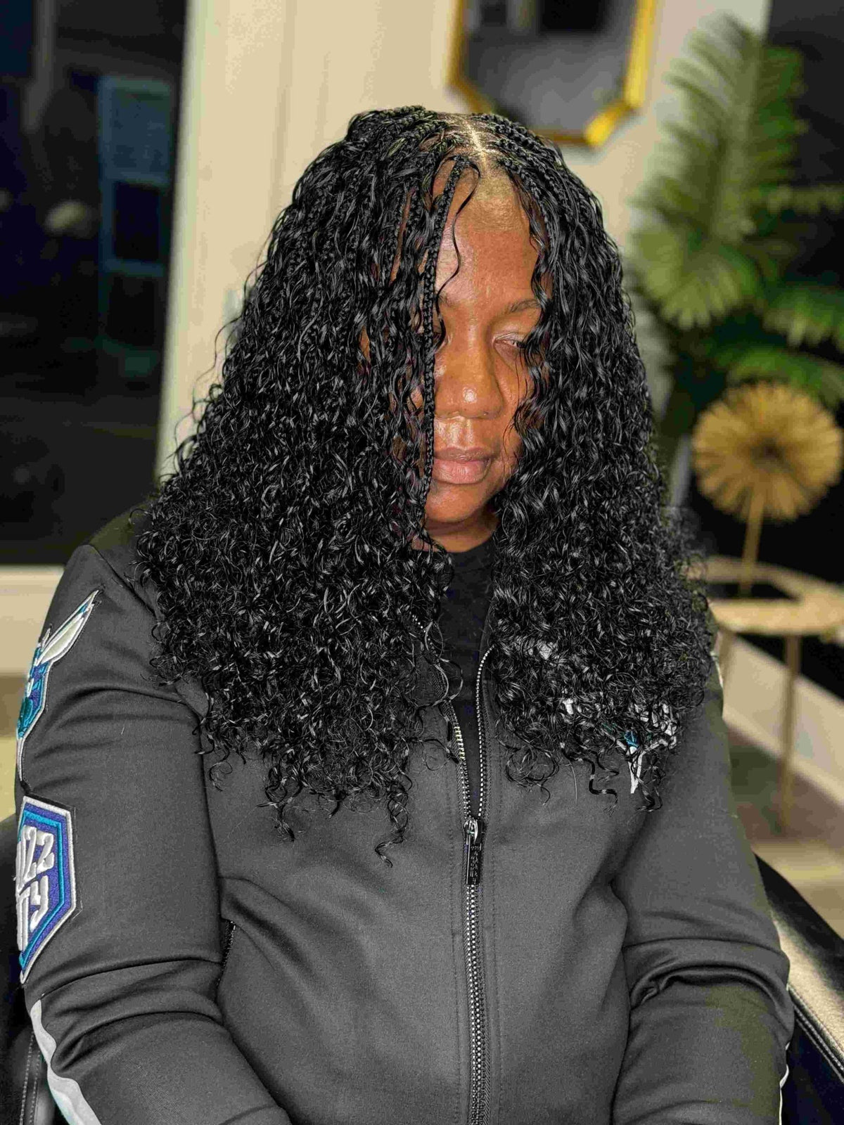 Fula Beauty Italian Curl boho hair extension in natural black 1B with soft, defined curls, showcasing a stylish hair look.