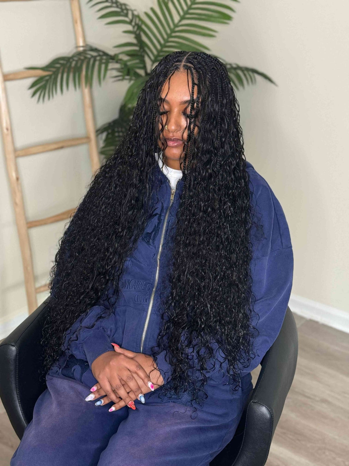 Fula Beauty Italian Curl boho hair in natural black, showcasing wavy, voluminous curls with a stylish and relaxed look.