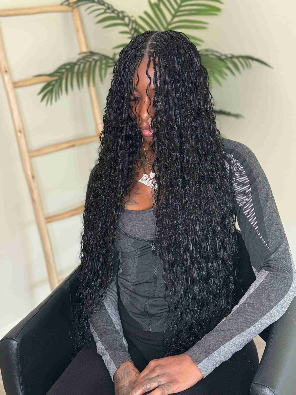 Natural black Italian Curl boho hair extension by Fula Beauty, showcasing soft, voluminous curly hair with a natural finish.