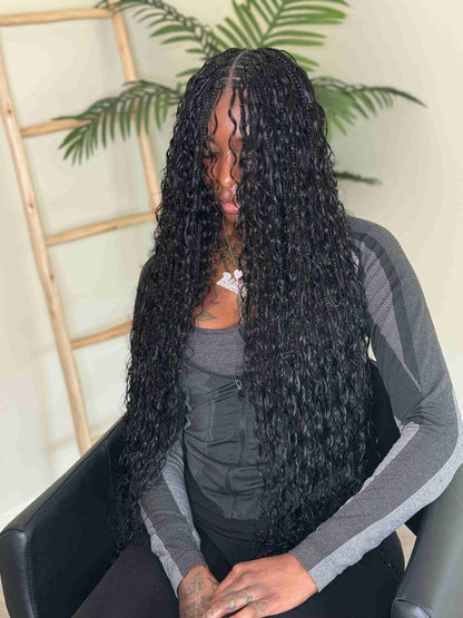 Natural black Italian Curl boho hair extension by Fula Beauty, showcasing soft, voluminous curly hair with a natural finish.