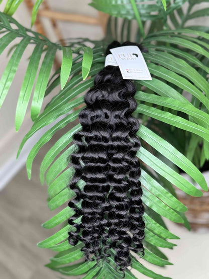 Natural black Italian Curl boho hair extension by Fula Beauty with soft, defined curls and a natural finish.