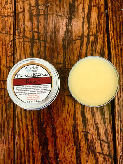 Soaplicity Rogue Hard Wired Beard Balm in a jar, showcasing the natural beard balm product with a focus on the packaging and texture.