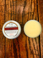Soaplicity Rogue Hard Wired Beard Balm in a jar, showcasing the natural beard balm product with a focus on the packaging and texture.