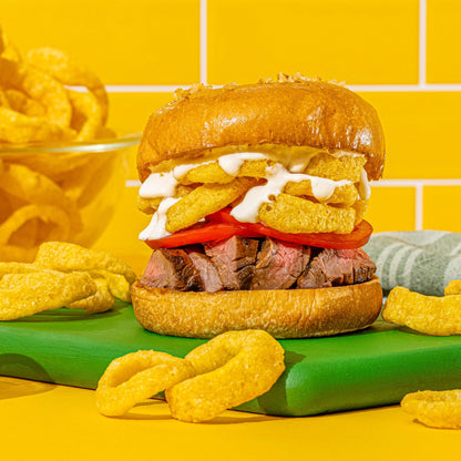 Funyuns Onion Flavored Rings Snacks in a 5.25 oz bag, showing crispy, golden onion-flavored snack rings on the bag.