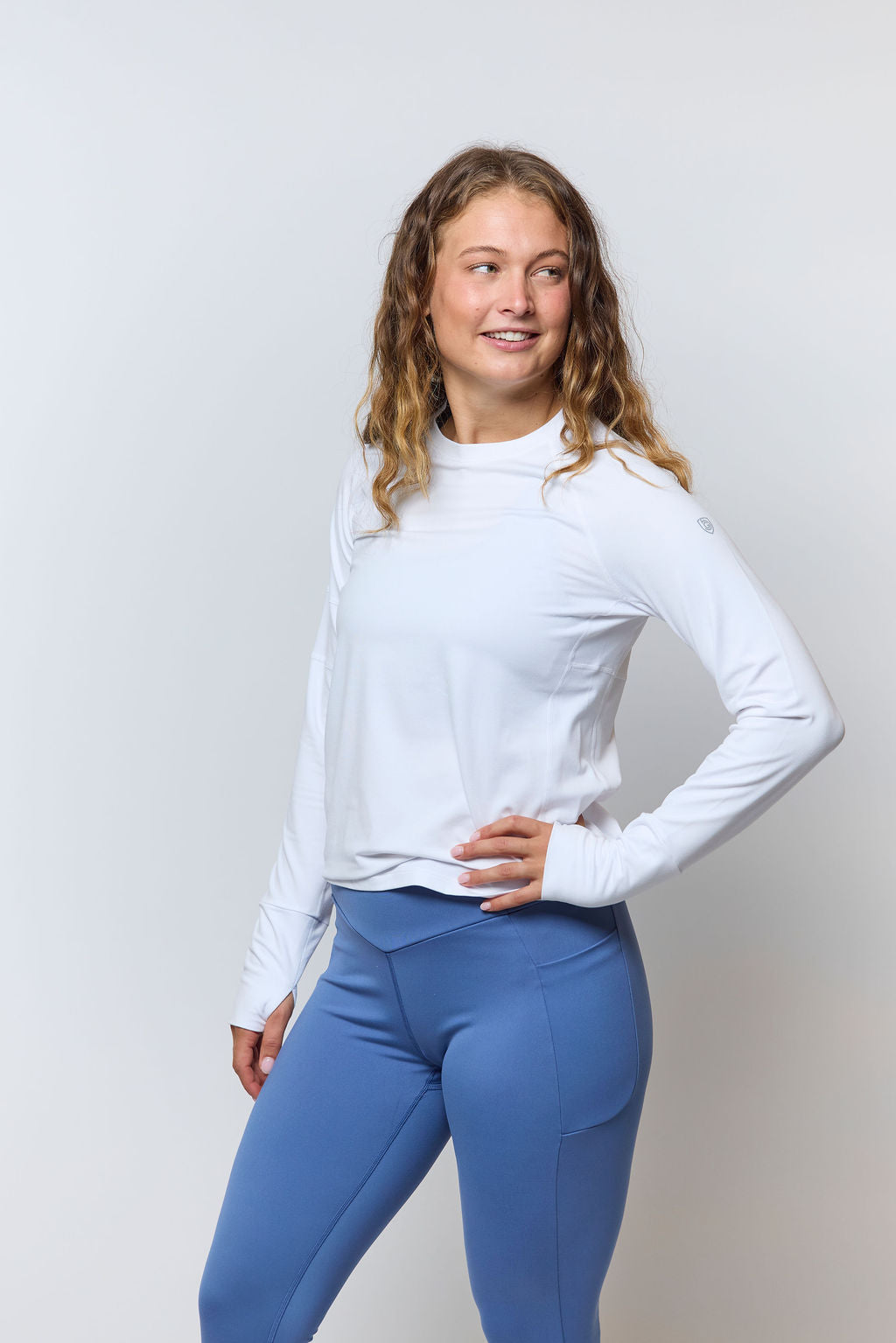 Goal Five Go Again women's full-length leggings in coastal color, shown on a model, highlighting comfortable stretch and sleek fit.