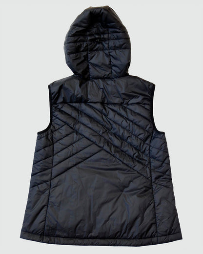 Black Goal Five Powerstripe eco-friendly down hooded vest worn as a lifestyle outerwear piece, showcasing its lightweight, insulated design.