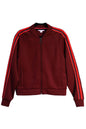 Goal Five Powerstripe LS Track Jacket in black, lifestyle image showing the sporty design and comfortable fit.