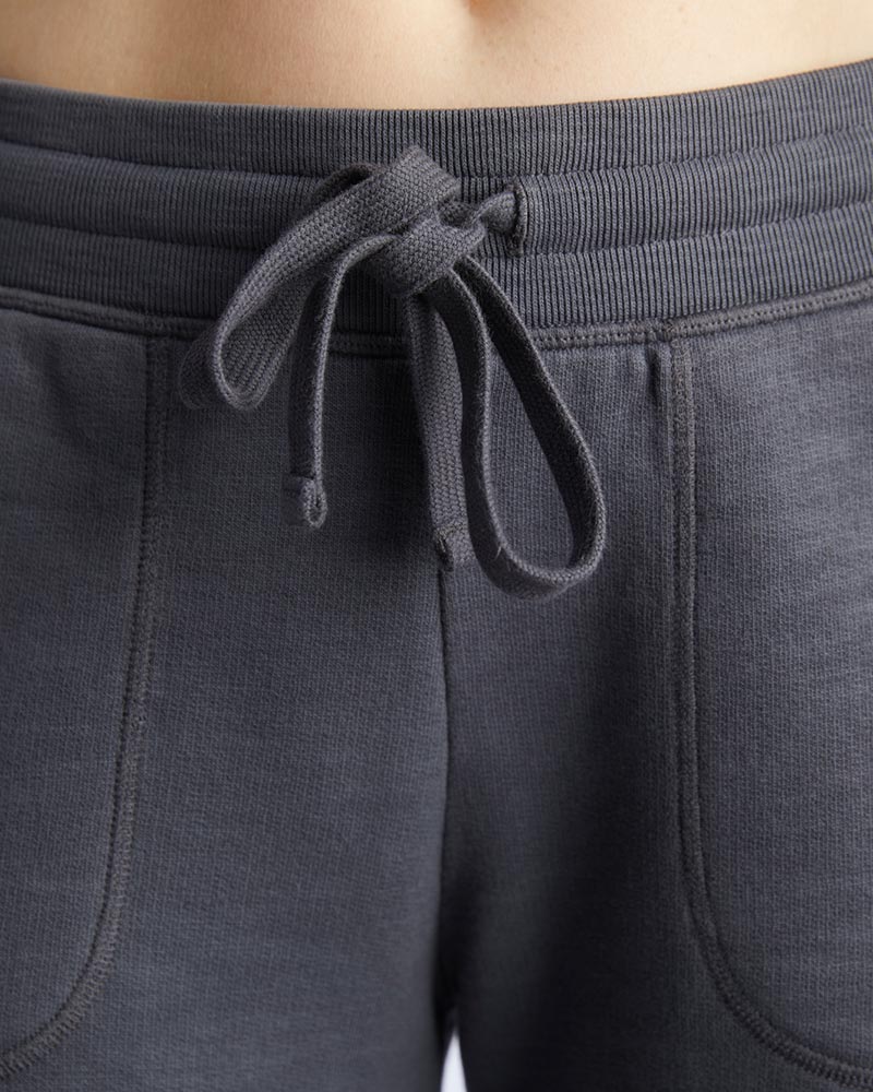 Goal Five Freasy Jogger in lifestyle image, showing the lightweight, comfortable gray joggers with relaxed fit and soft fabric.