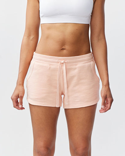 Goal Five Freasy Short in dark moss, lifestyle image showing lightweight, comfortable shorts designed for relaxed wear.