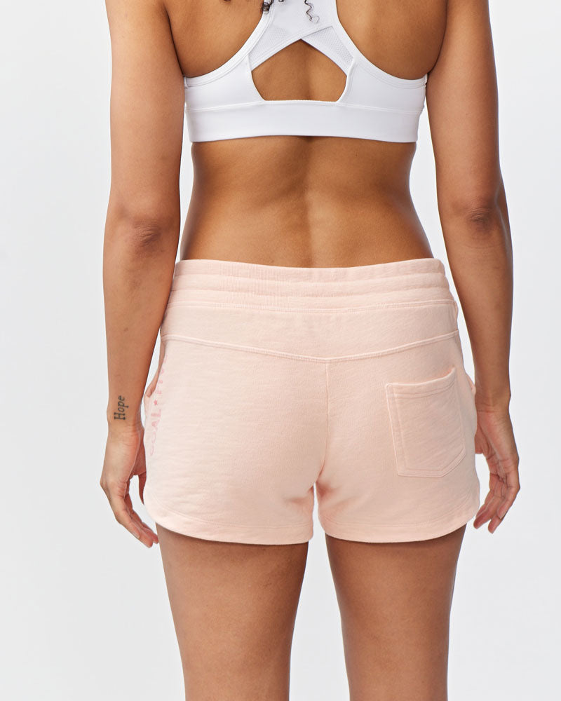 Goal Five Freasy Short in dark moss, lifestyle image showing lightweight, comfortable shorts for active wear.