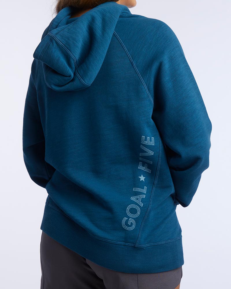 Dark teal Goal Five Freasy women's relaxed fit hoodie, lifestyle image showing front view of cozy, casual casual hoodie for women.