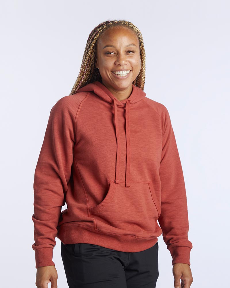 Dark teal Goal Five Freasy women's relaxed fit hoodie, lifestyle image showing soft fabric and casual style.