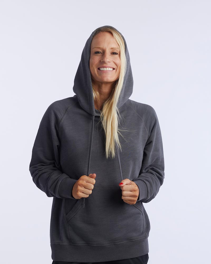 Dark teal Goal Five Freasy women's relaxed fit hoodie, casual lifestyle image showing soft fabric and comfortable fit.