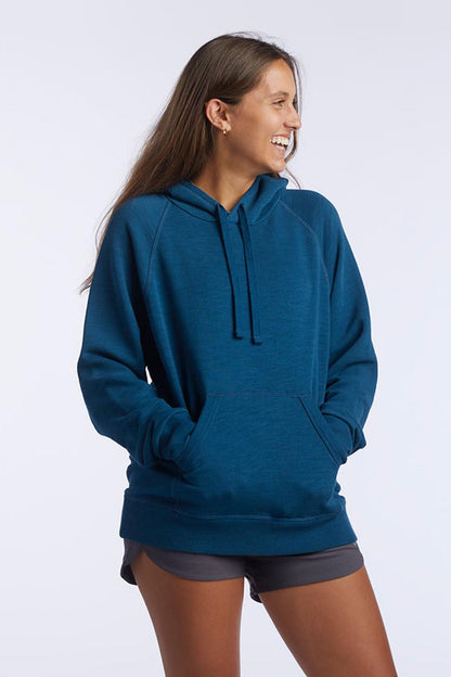 Dark teal Goal Five Freasy women's relaxed fit hoodie, lifestyle image showing comfortable casual wear, XS size.