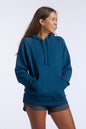 Dark teal Goal Five Freasy women's relaxed fit hoodie, lifestyle image showing comfortable casual wear, XS size.