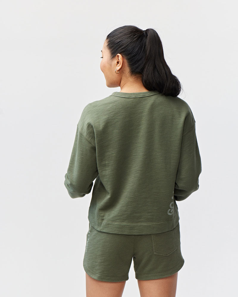 Goal Five Freasy Crew lifestyle image showing a cozy, casual fit in a vibrant Nectar XS color, perfect for everyday wear.