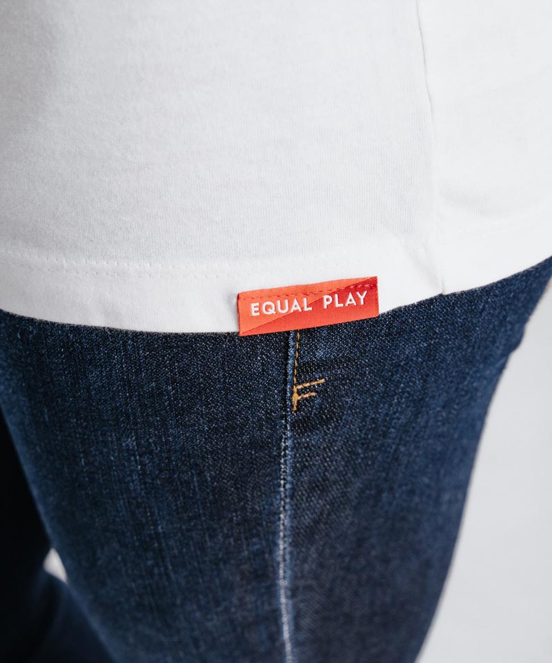 White Equal Play women's soccer T-shirt by Goal Five, casual lifestyle shirt featuring soccer-themed design on front.