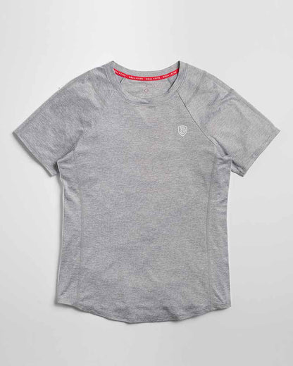 Advance Women's Training Top by Goal Five in ash heather, shown on a model, designed for comfortable activewear and workout sessions.
