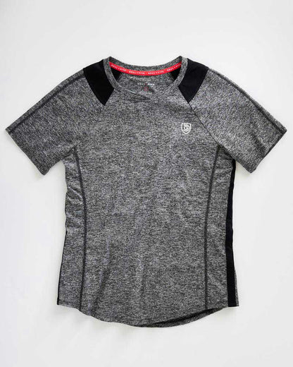 Advance Women's Training Top by Goal Five in ash heather, shown on a model, designed for active workout and training sessions.