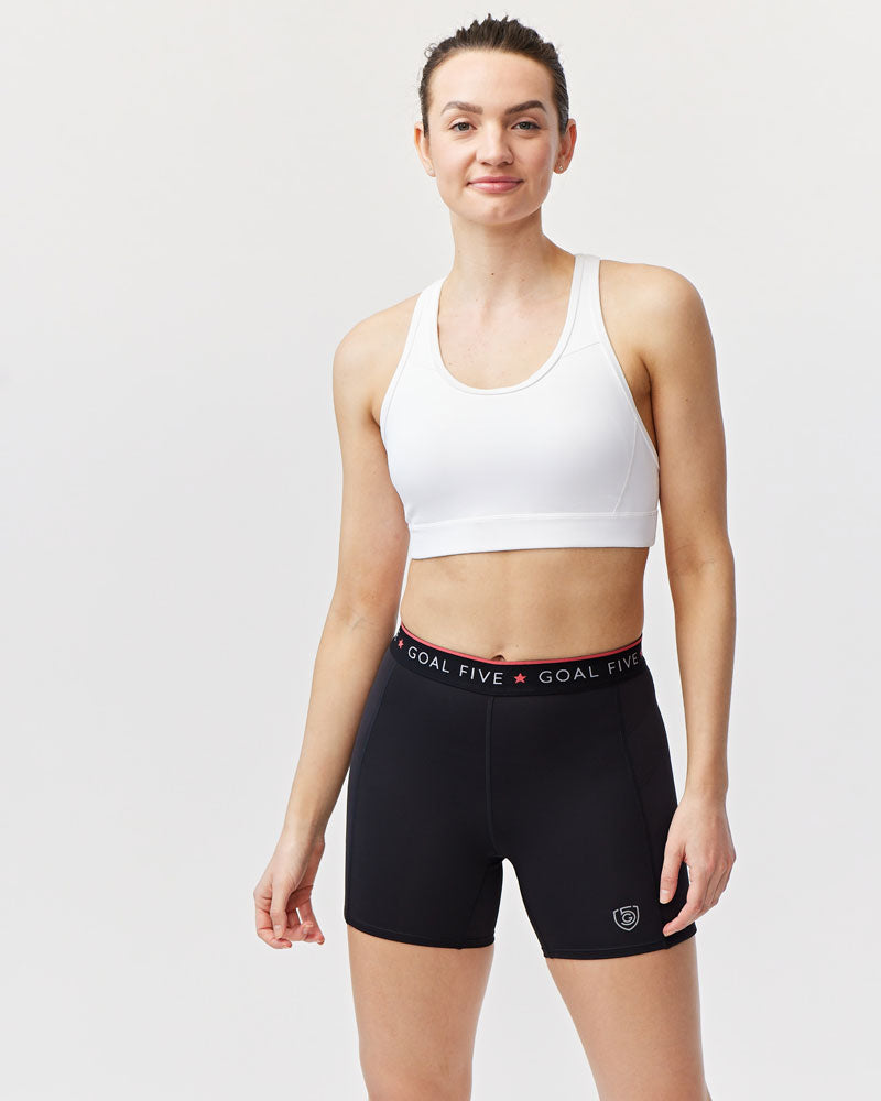 Black Goal Five Women's Spandex Shorts for training, featuring elastic waistband and logo detail, ideal for workout and active wear.