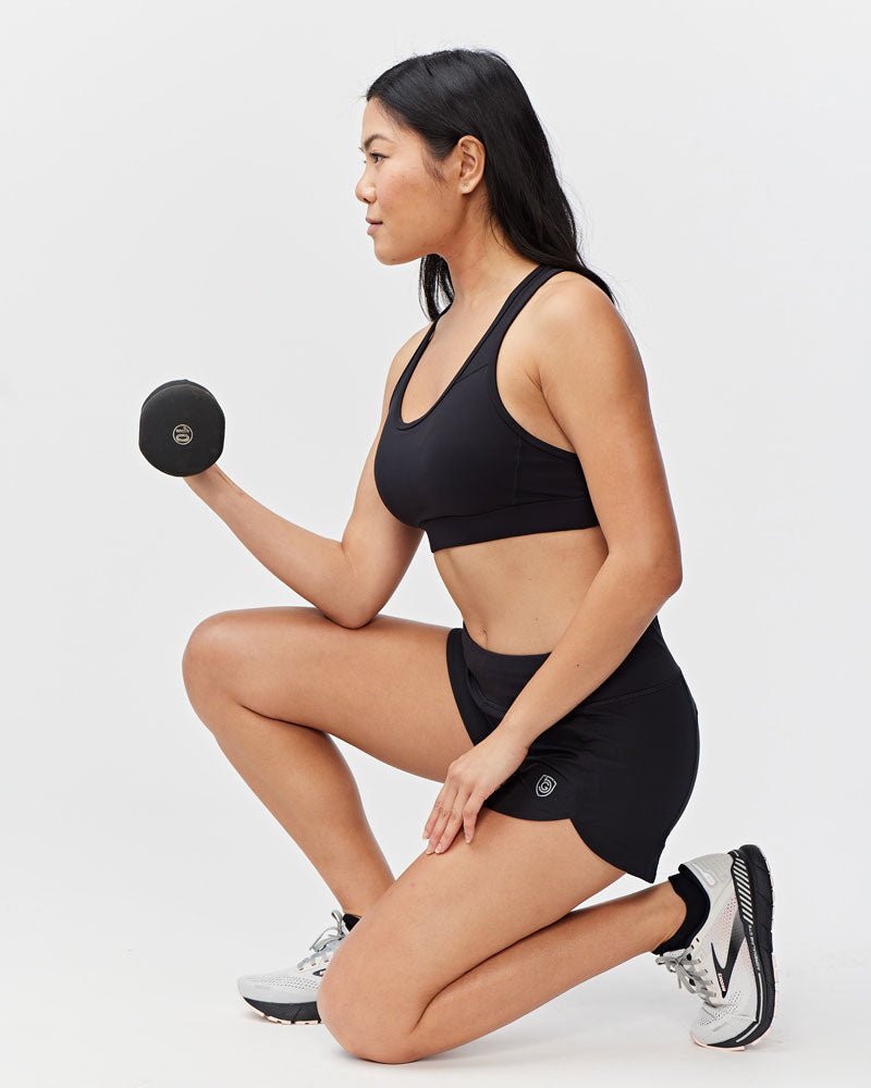 Black Excel women's workout shorts by Goal Five, training shorts with a comfortable fit and athletic design for active wear.