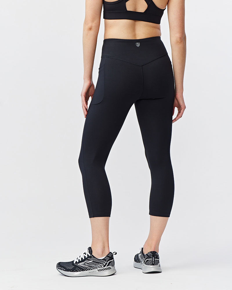 Black Goal Five women's cropped training leggings, 21-inch length, comfortable fit, ideal for workout and active wear.