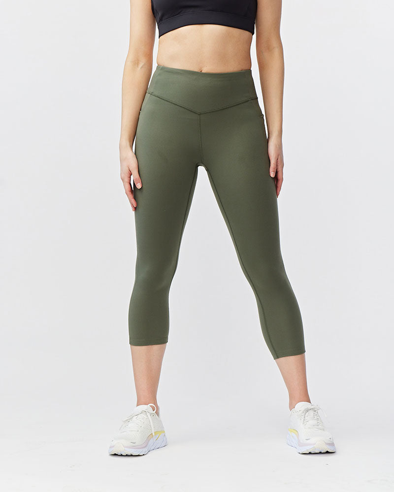 Black Goal Five women's cropped training leggings, 21-inch length, shown on a model highlighting the fit and comfortable stretch.
