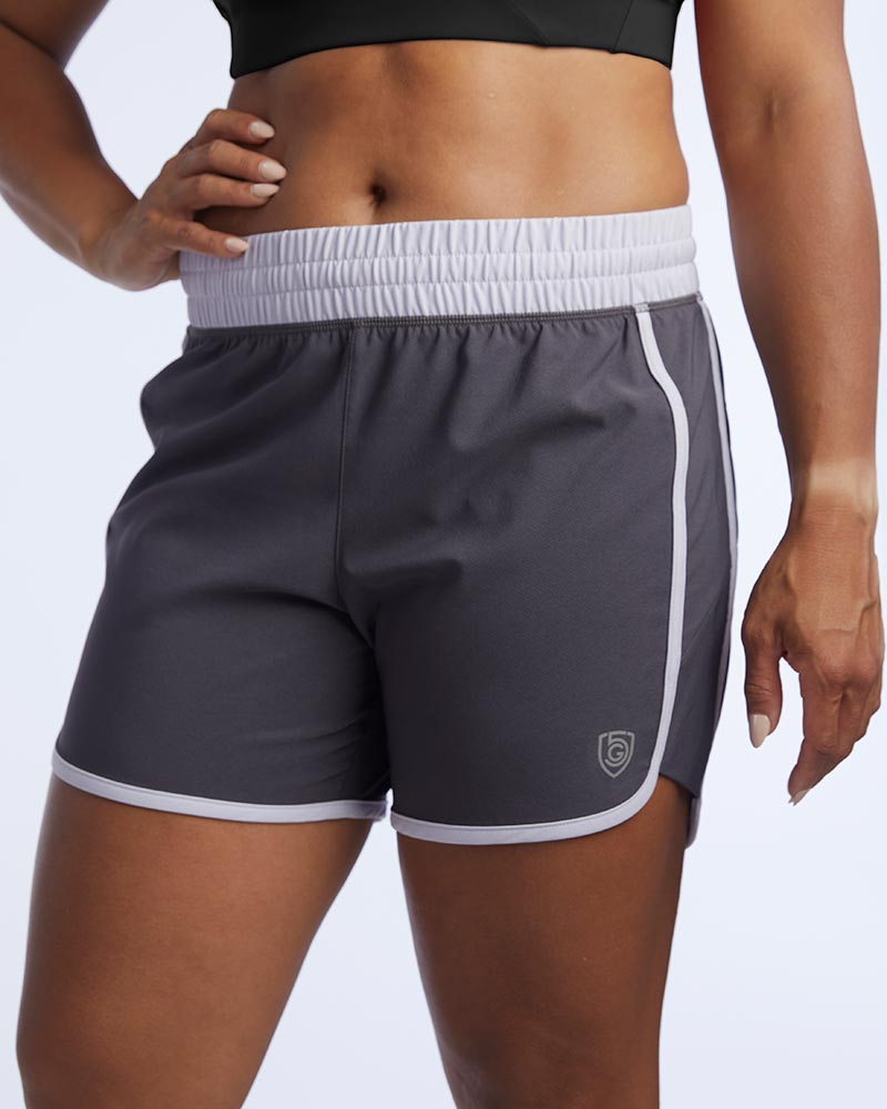 Black Indie Women's Sport Shorts by Goal Five, training shorts displayed on a model, ideal for athletic and workout activities.