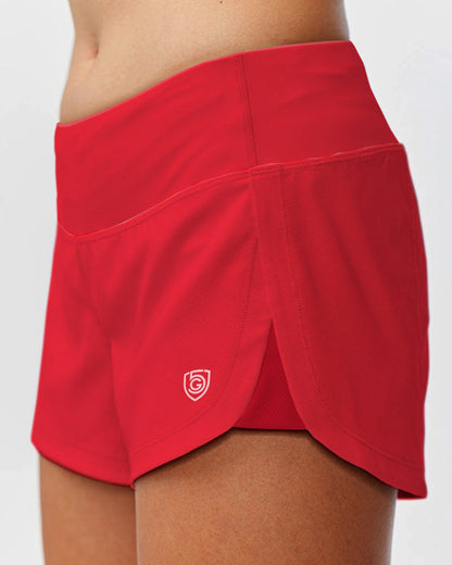 Goal Five women's training workout shorts in vibrant hot coral, designed for comfort and performance during exercise.