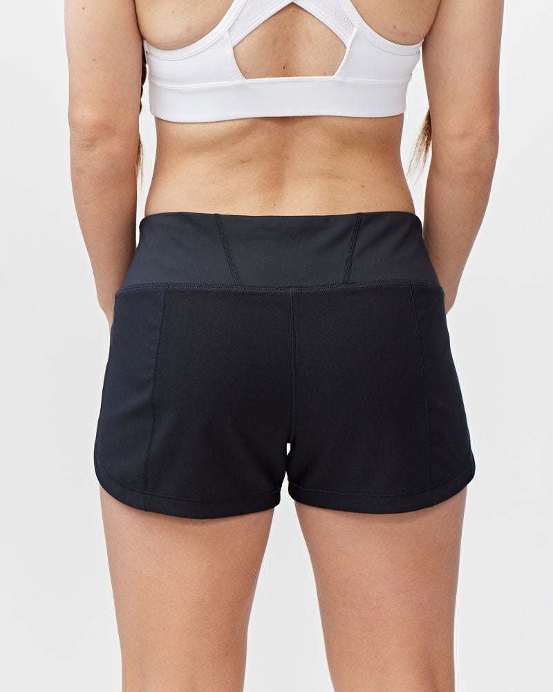 Goal Five women's training shorts in hot coral, lightweight and fast-drying for comfortable workout wear.
