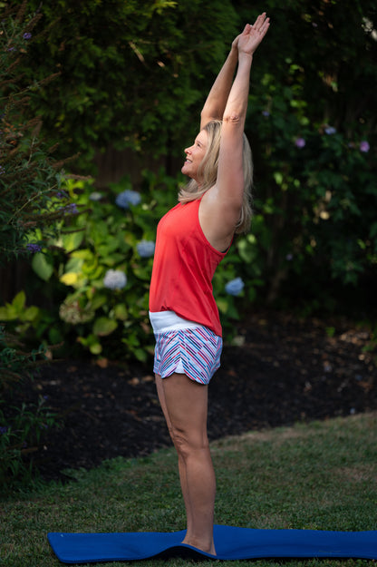 Goal Five women's training workout shorts in vibrant coral, designed for fast and free movement during exercise.