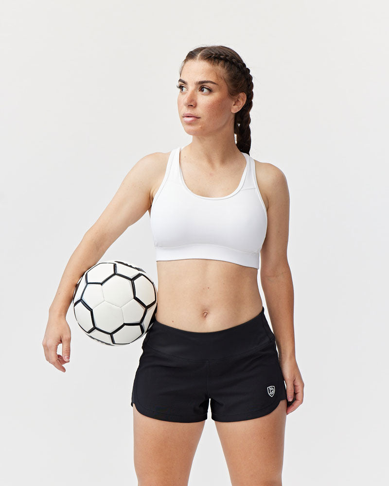 Goal Five women's training workout shorts in vibrant hot coral, lightweight and designed for comfortable exercise.