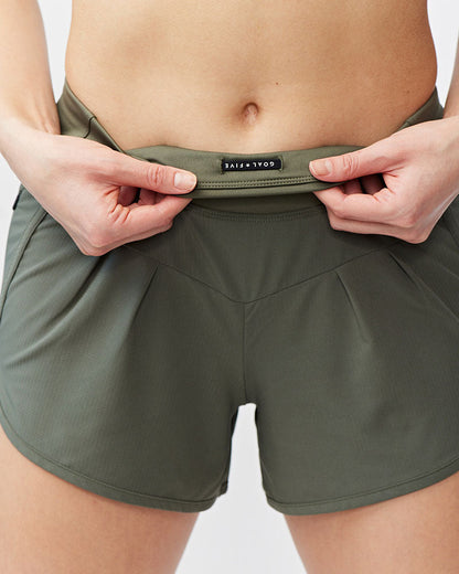 Goal Five Sheva women's high-rise running shorts in hot coral, training activewear designed for comfort and performance.