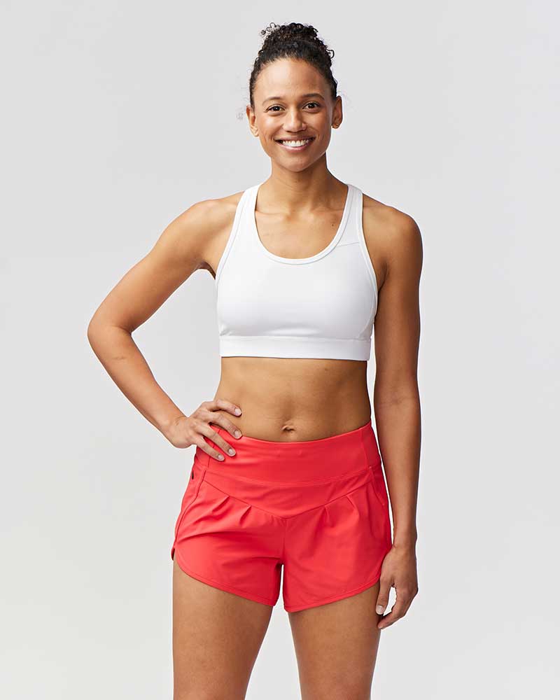 Goal Five Sheva women's high-rise running shorts in hot coral, designed for comfortable training and active wear.