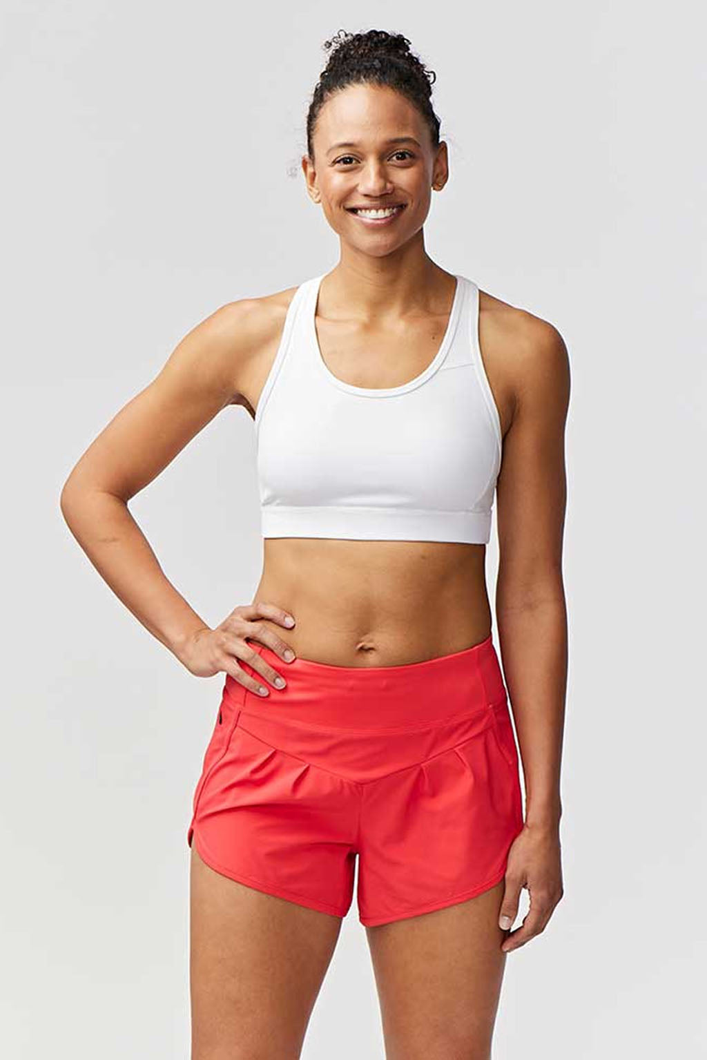 Goal Five Sheva women's high-rise running shorts in hot coral, designed for training and active wear.
