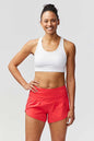 Goal Five Sheva women's high-rise running shorts in hot coral, designed for training and active wear.