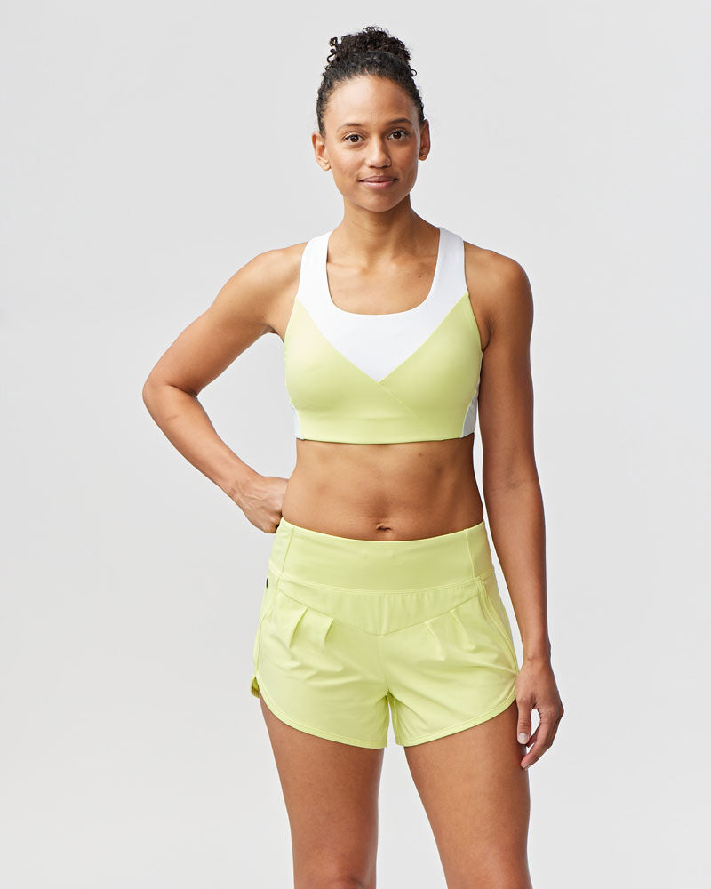 Goal Five Pionxr Training Bra Top in rose cinnabar color, featuring a snug fit and athletic design, worn for workout and fitness activities.