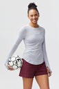 White Foudy women's long sleeve workout top by Goal Five, designed for training and active wear.