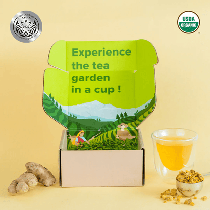 Organic Golden Turmeric Ginger blend from Nepal Tea, featuring vibrant golden turmeric and fresh ginger root in a natural setting.