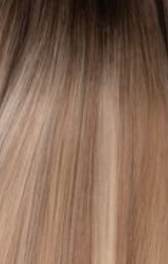 Rachel Paige XO Luxury Signature Weft Collection in a golden hue, showcasing high-quality hair extensions with a natural shine.